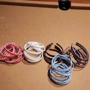 Set of Braided Bangles in Pink, White, Brown, and Blue